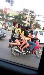 5 on bike.jpg