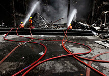 Fire-fighters-douse-the-C-005.jpg